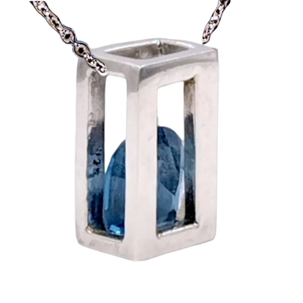 Sterling Silver Open Frame Pendant with Floating Blue Topaz on Stainless Chain